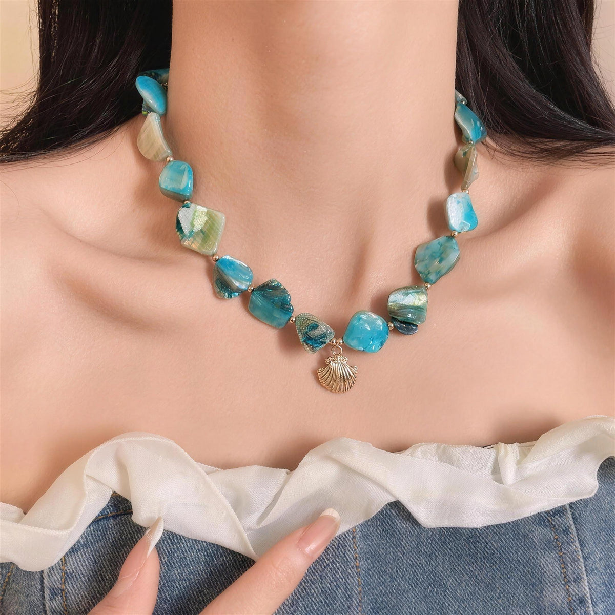 A Lagoon shell necklace shown at its true size