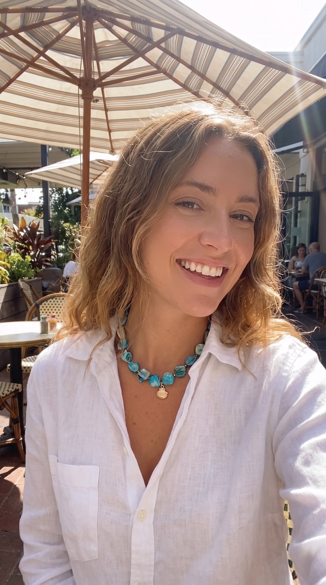 Jenna S. wearing the Ariel Lagoon Shell