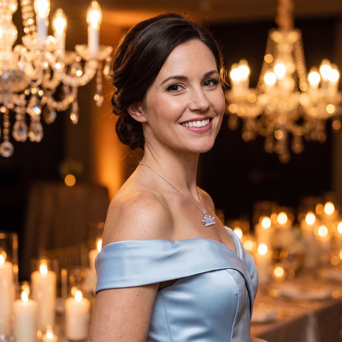 Woman in a pale blue gown wearing the Crystal Crown necklace