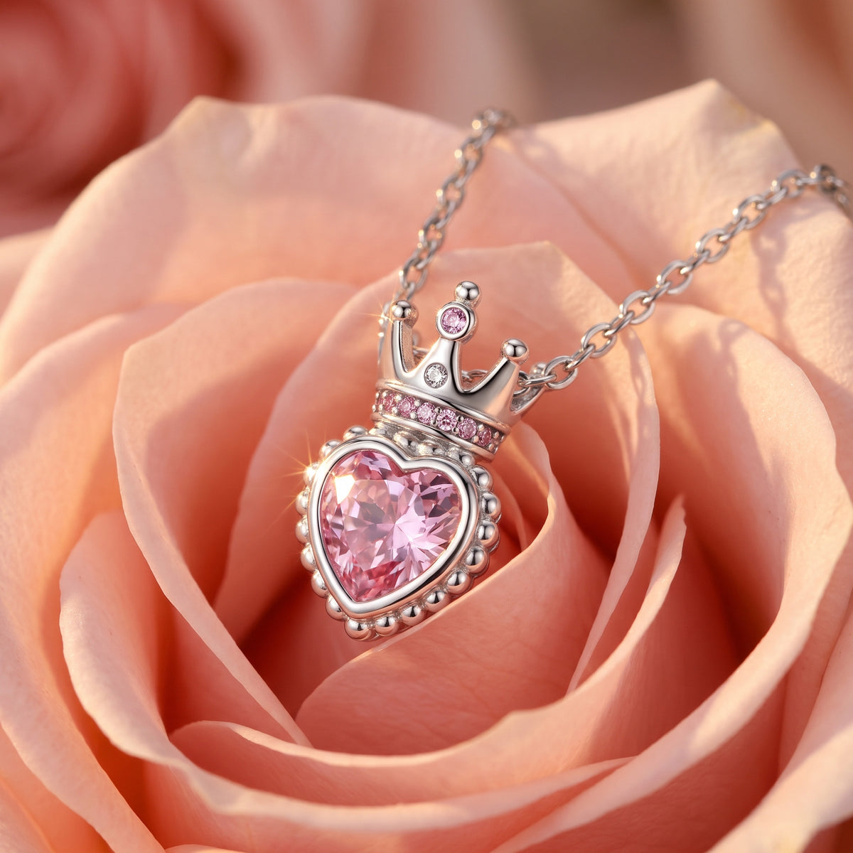 Close-up of the Rose Crown pendant with its pink crystal heart