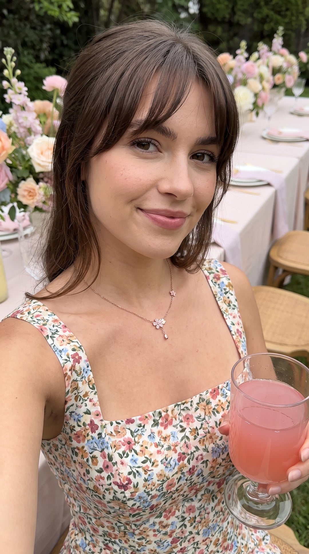 Mila R. wearing the Aurora Pink Blossom