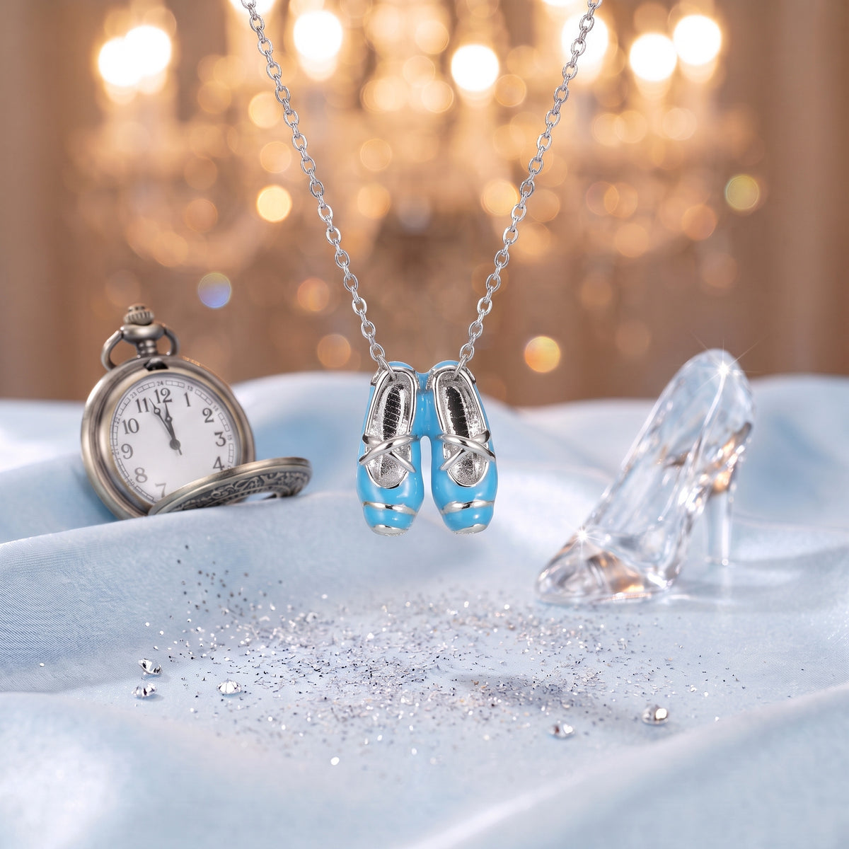 The “Cinderella” Blue Ballet Silver Necklace on ice-blue satin with a glass slipper and a pocket watch
