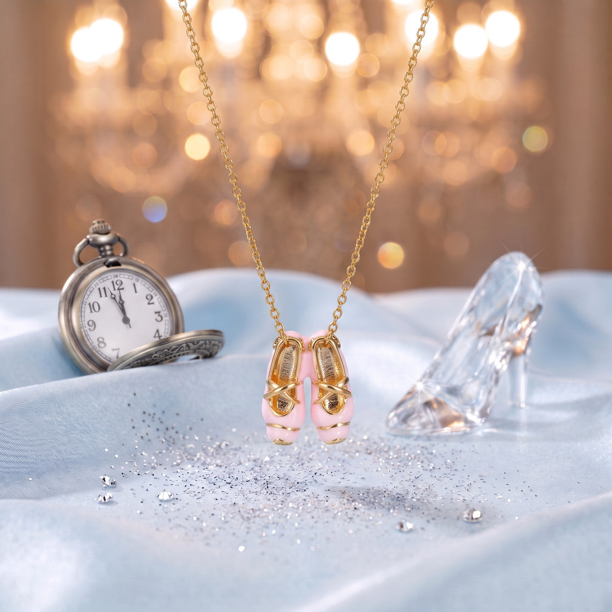 The “Cinderella” Pink Ballet Gold Necklace on ice-blue satin with a glass slipper and a pocket watch