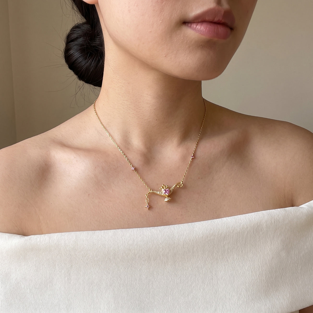 Woman wearing the Jasmine Wish Lamp necklace