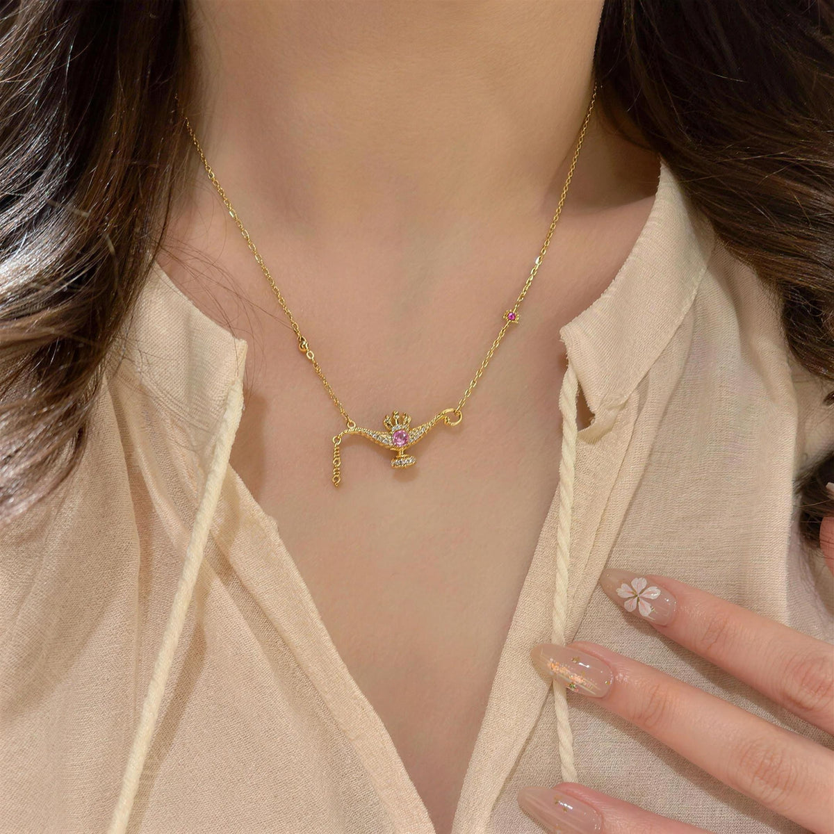 The Wish Lamp necklace shown at its true size