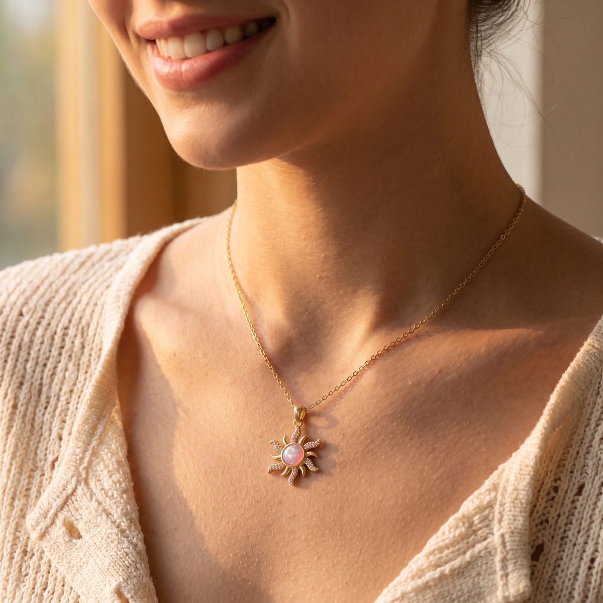 Woman wearing the Rapunzel Rose Opal sun necklace