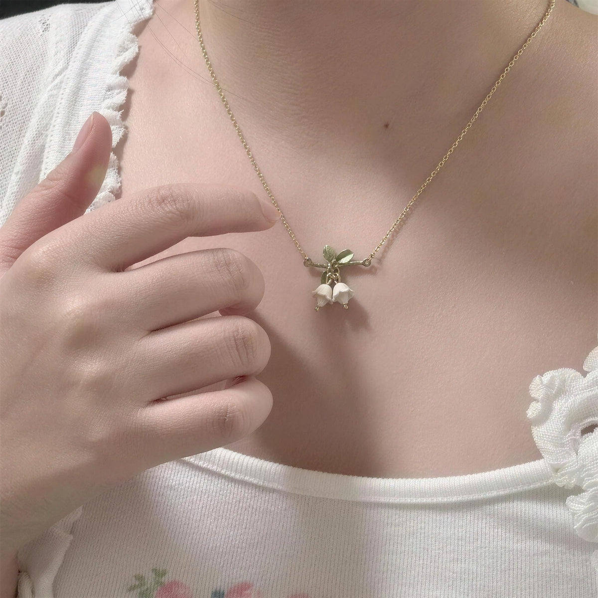 The Golden Lily necklace shown at its true size