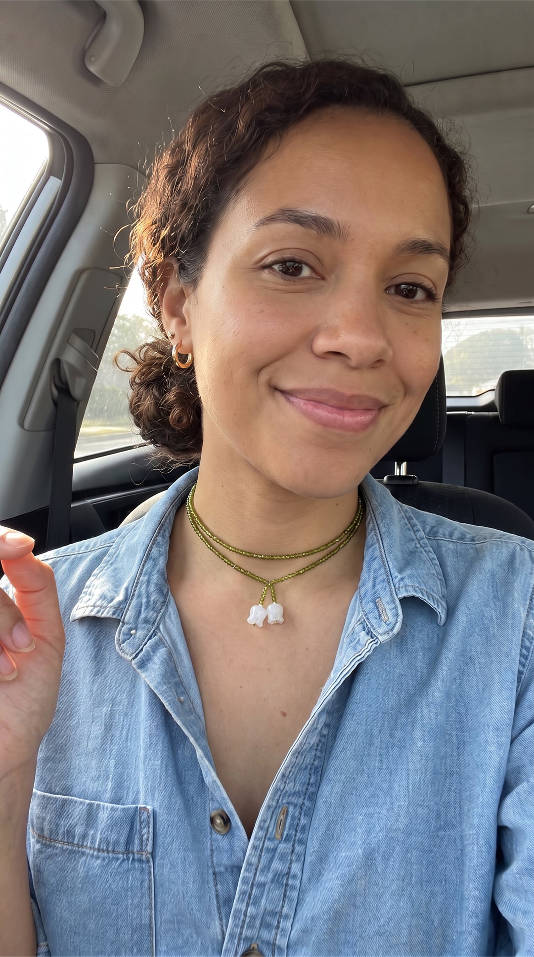 Marisol F. wearing the Tiana Emerald Lily